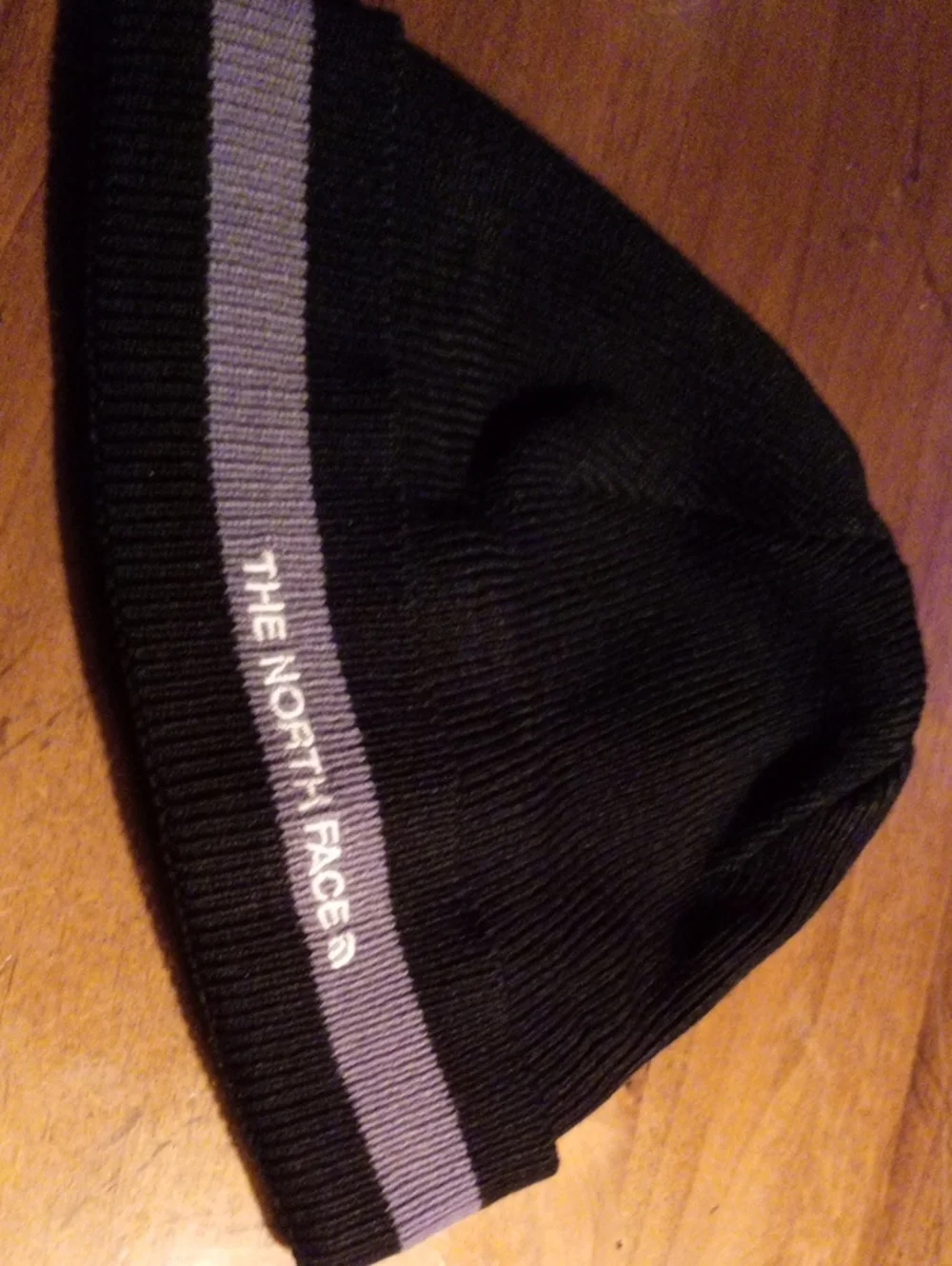 The North Face Black Beanie with Gray Stripe and Logo